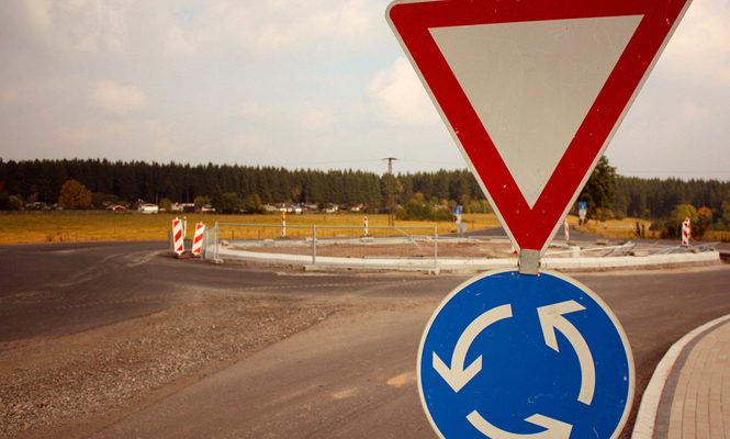 Roundabout Sign. Photo by herrolm on Flickr.